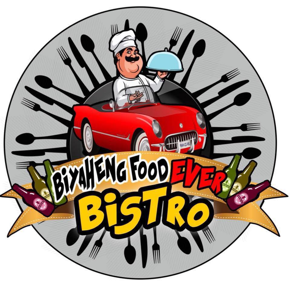 Professional catering team in kitchen preparing elegant dishes for a wedding reception